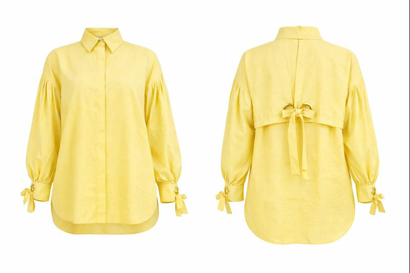 Elegante Bluse mit Ballonärmel und Ösendetail - Gelb