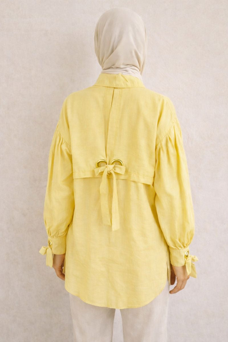 Elegante Bluse mit Ballonärmel und Ösendetail - Gelb