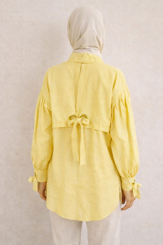 Elegante Bluse mit Ballonärmel und Ösendetail - Gelb